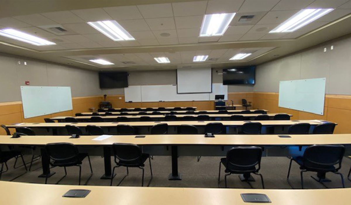 A lecture room in Wenatchi Hall facing the presentation screens.