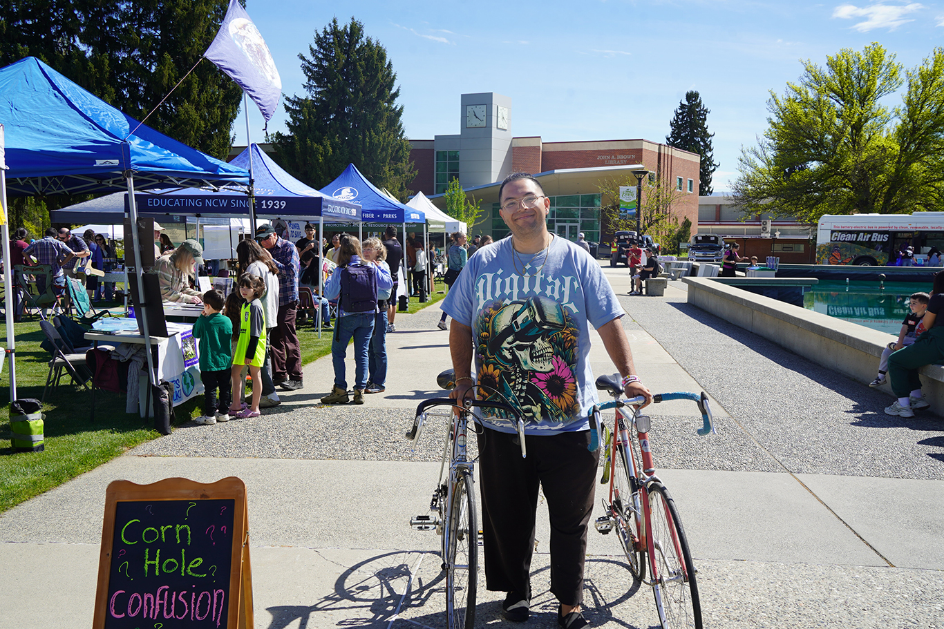 Community member with bicycle for repair