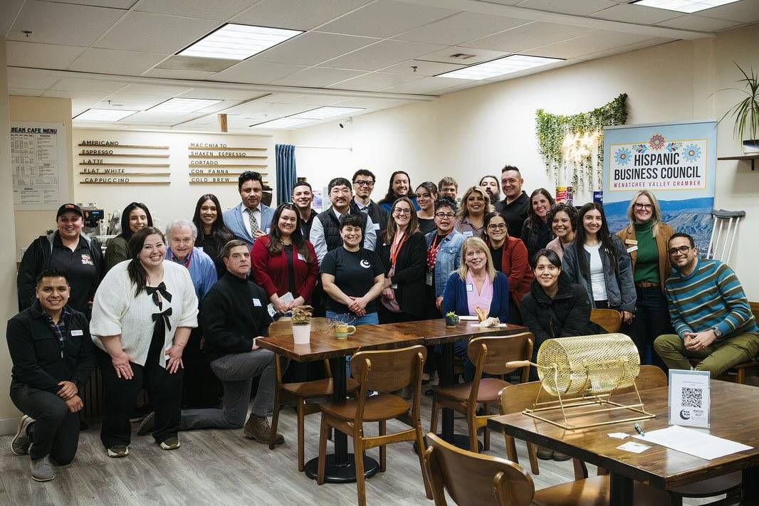 Group photo of community members at Conexion hosted at Moon Bean Cafe in East Wenatchee