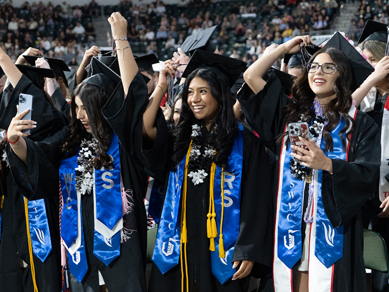Running Start graduates at graduation