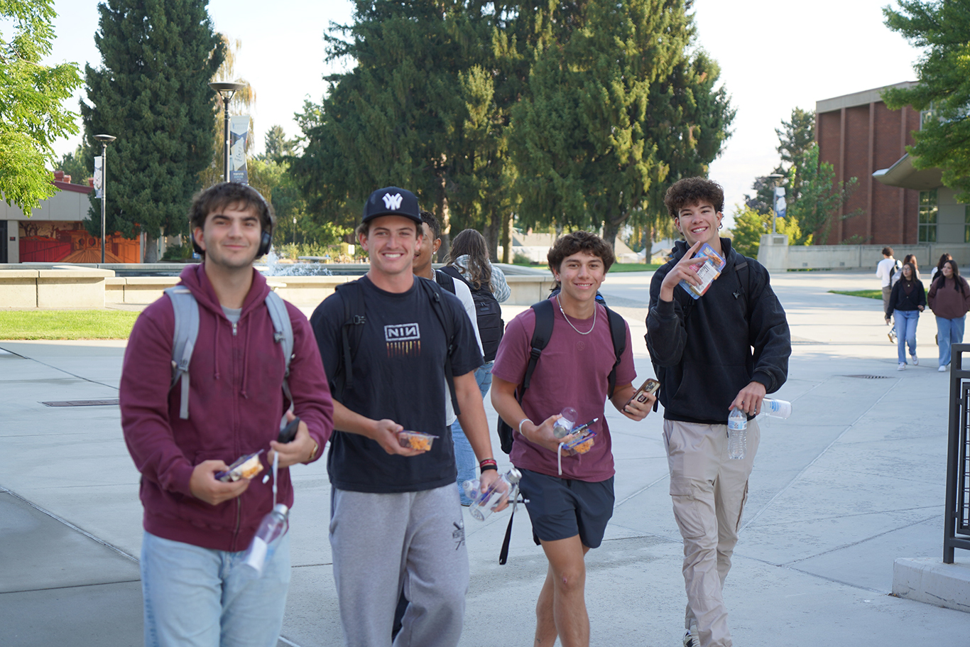 Baseball students walking on Wenatchee campus