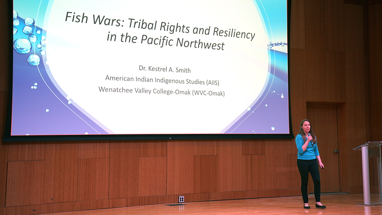 Professor Kestrel Smith presents "Fish Wars" at a WVC Speaks Lecture Series event in The Grove Recital Hall.