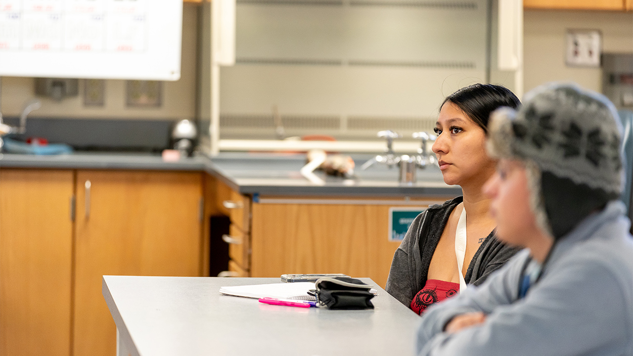 Two students sit at a long table in the science lab at the WVC Omak campus.