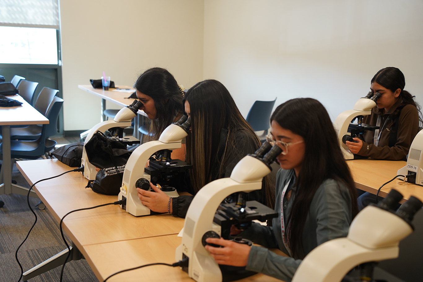 Photo of students using microscopes