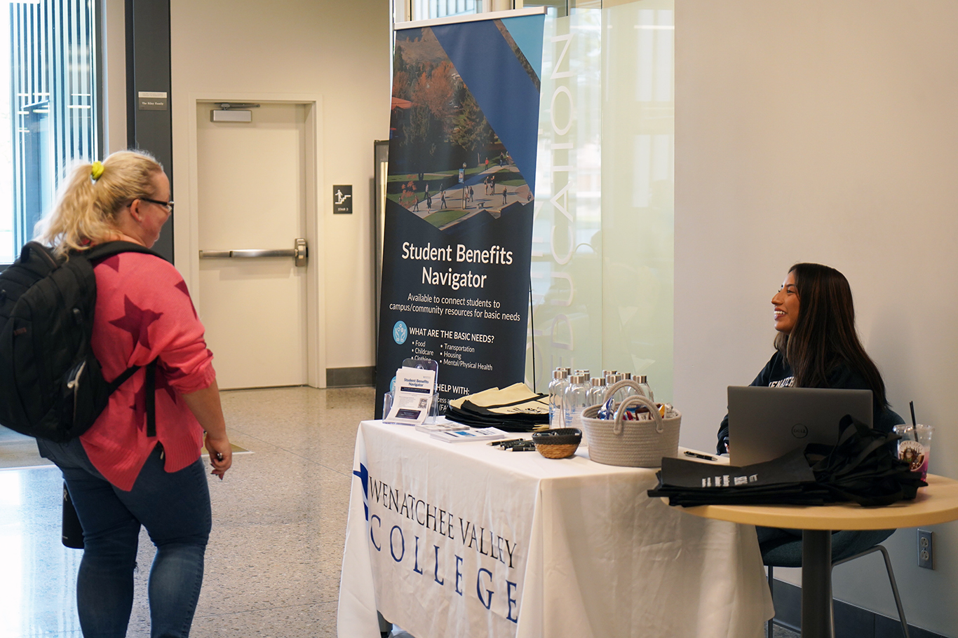 Staff helping a student